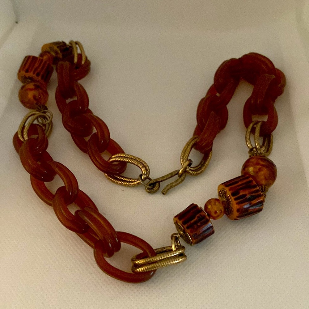 Vintage Bakelite link necklace with bakelite wood log beads. Textured gold links